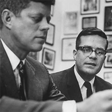 Ted Sorensen talks with President Kennedy.